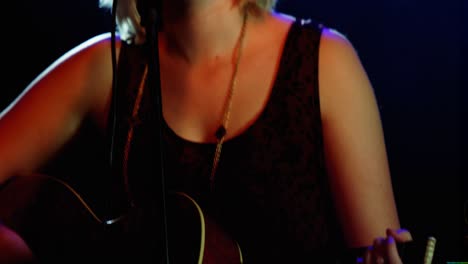 singer performing on stage
