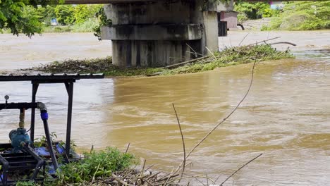 River-With-High-Water-Level-Flowing-Under-The-Bridge-During-Extreme-Flooding-In-Northern-Thailand