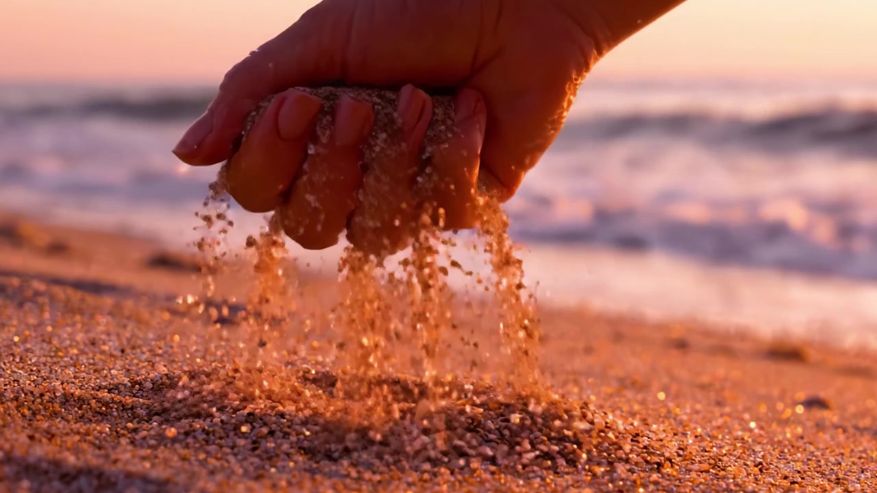 A Serene Evening on the Shore: Touching Soft Sand as Waves Gently Lapping on the Beach, Capturing the Tranquility of Nature's Beauty at Twilight