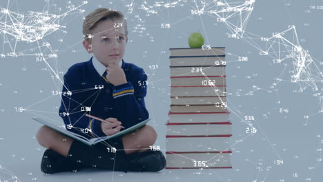 animación de un niño sentado junto a una pila de libros con una red de conectados en el fondo