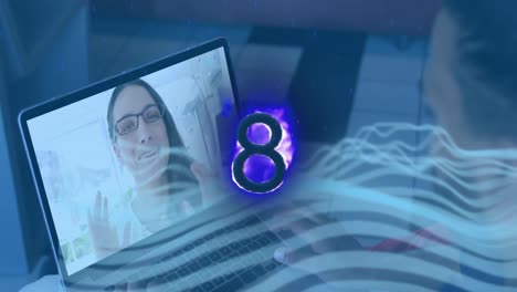 Animation-of-burning-number-eight-over-caucasian-businesswoman-having-video-call