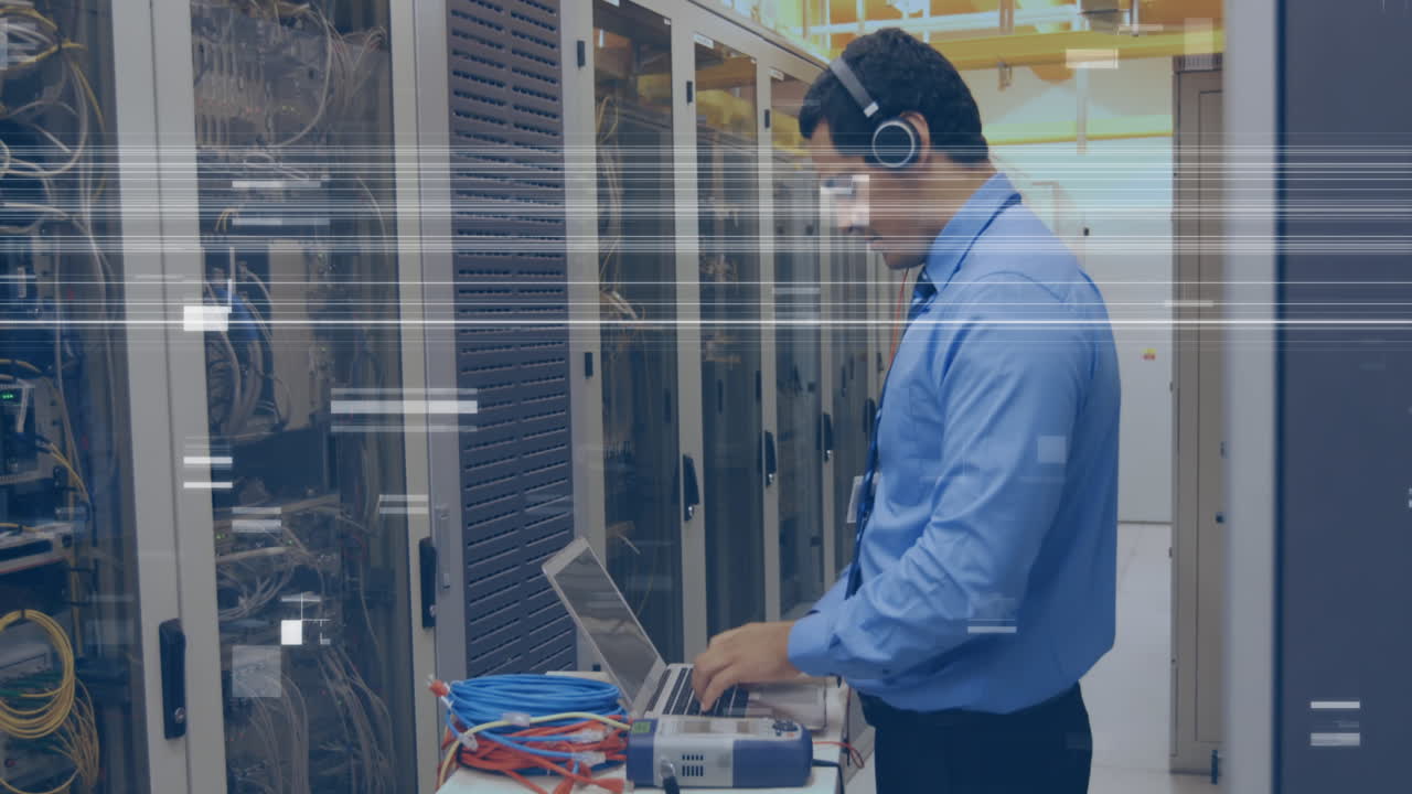 Animation of glitch over caucasian man checking servers