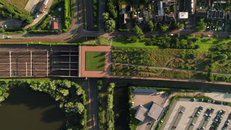 above scenic landscape of railway station in barendrecht, netherlands. aerial topdown shot
