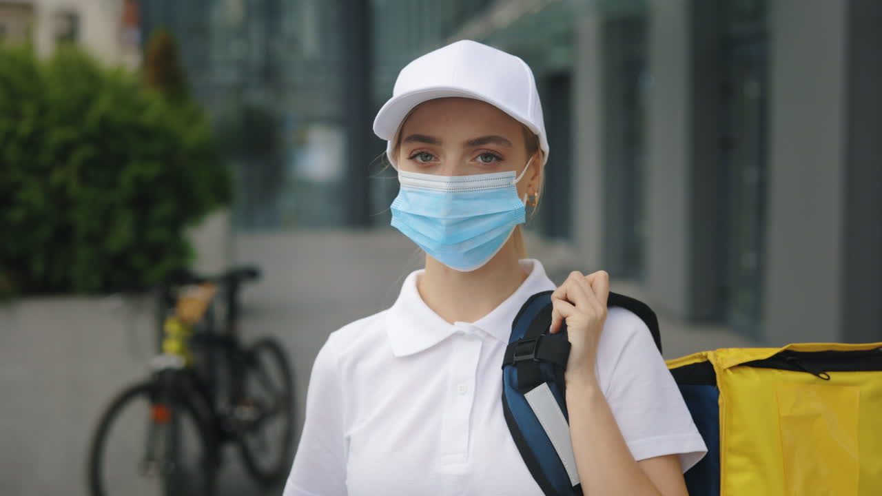 Delivery Person with Mask and Bag
