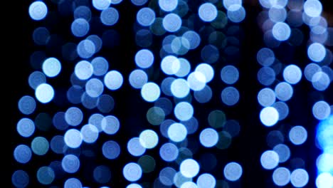 lámpara de aceite luces coloridas círculos bokeh en la oscuridad