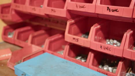 Slider-and-panning-shot-of-a-tool-shelf-inside-an-engineering-workshop