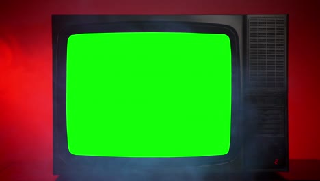 은 배경에 박이는 녹색 화면과 오래된 빈티지 텔레비전, 구식 검은 tv, 연기 반사, 정적 소음, 깨진 전자 장치, 방송 개념