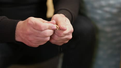 inspecting fresh almonds: a close-up of handheld nuts