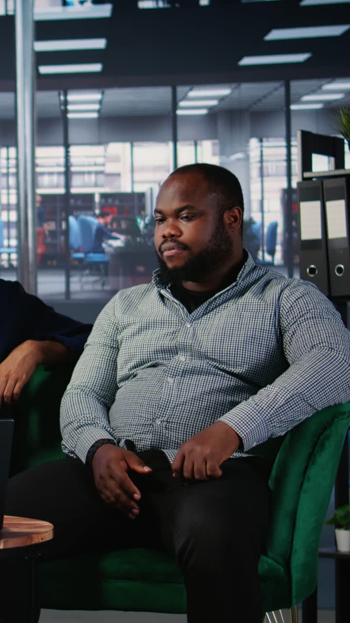 Vertical Video Business people attending an online web conference during a meeting