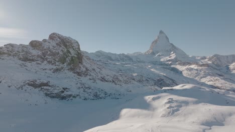 sideways aerial of epic matterhorn mountain panorama, zermatt switzerland