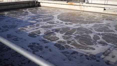 Water-treatment-tank-with-wastewater,-aeration-process