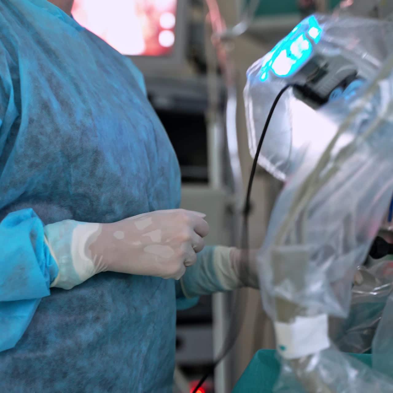 Robotic arms for minimally invasive surgery. Female surgeon perform a delicate operation using medical surgical robot. Modern medicine in hospital.