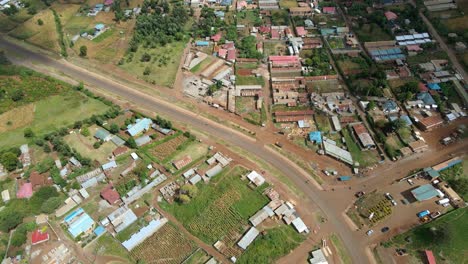 aerial drone view overlooking streets and houses in the oloitokitok town, in kenya