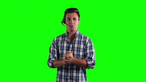 Animation-of-a-Caucasian-man-using-an-earpiece-and-talking-in-a-green-background