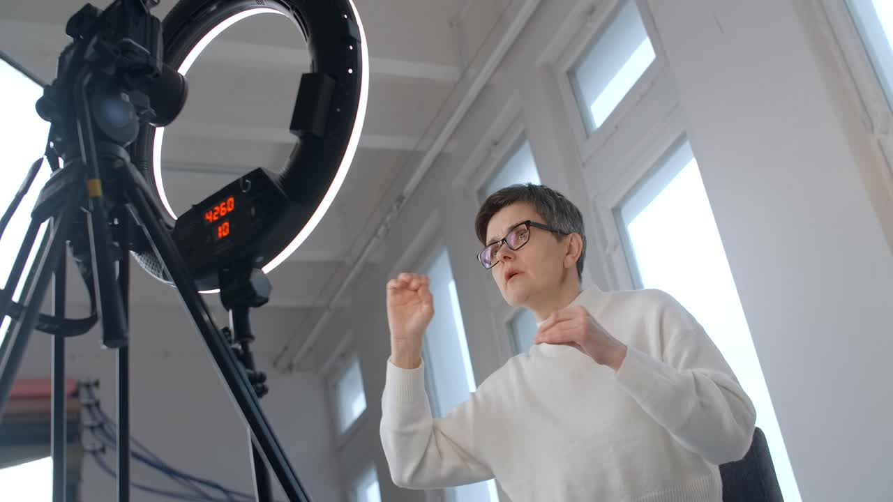 Woman Recording Video with Ring Light