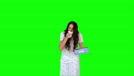 Sick-young-model-in-pyjamas-sneezing