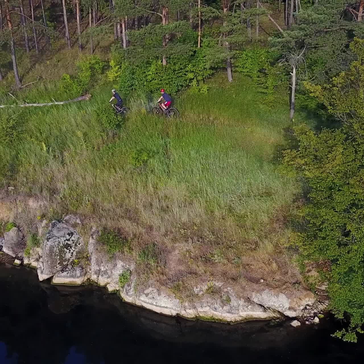 Men Running On A Mountain Bike