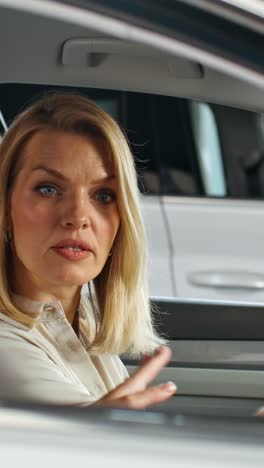 women discussing in car