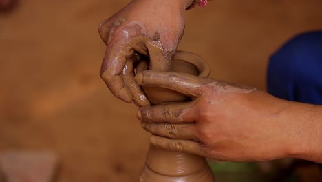 potter at work makes ceramic dishes. india, rajasthan.