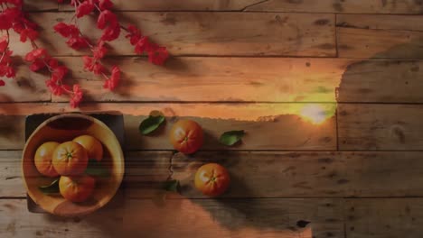 animation of chinese traditional decorations with sunset on wooden background