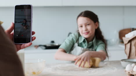 girl kneading a dough