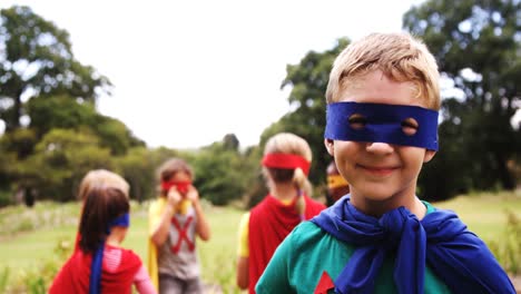 group of kids pretending to be a super hero