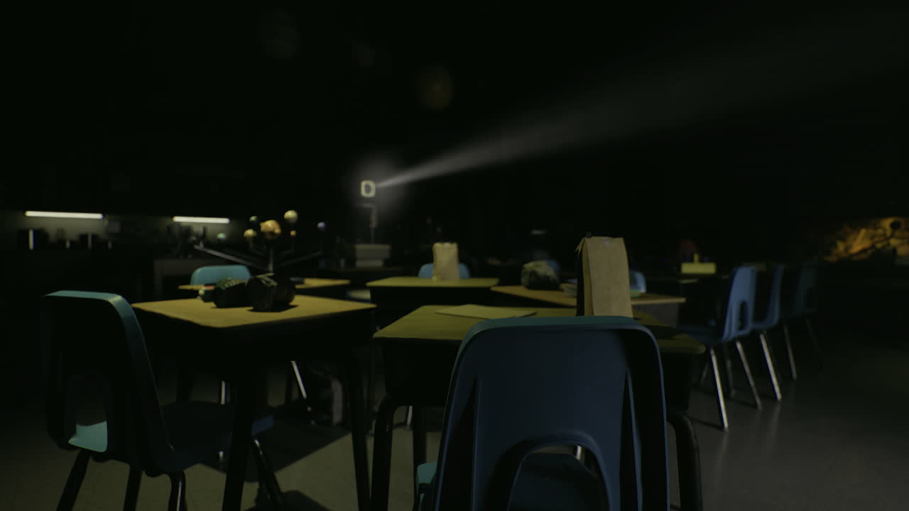 Dark classroom with desks and projector illuminating empty space at night