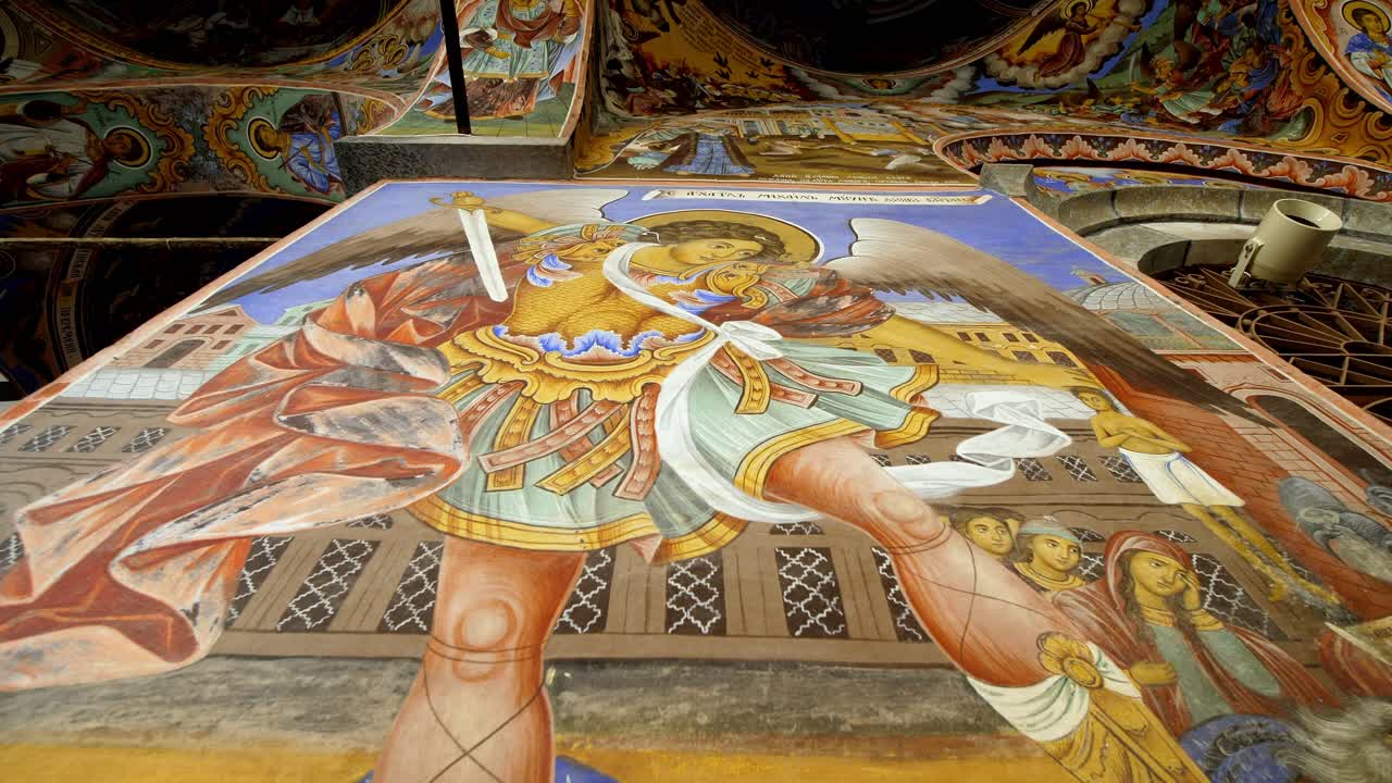 Interior fresco of Saint Michael with a sword at Rila Monastery, Bulgaria, highlighting medieval Orthodox art, sacred iconography, and vibrant historic detail