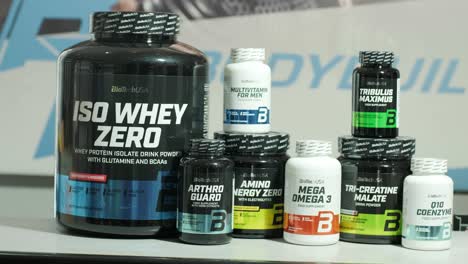 sport nutrition store interior with large choice of nutritional supplements.