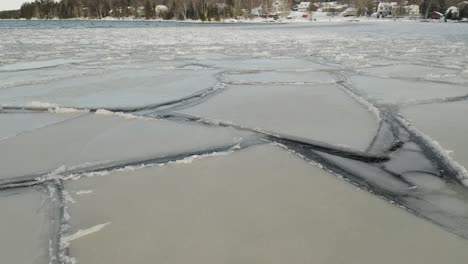 sheets of ice forming over lake wilderness