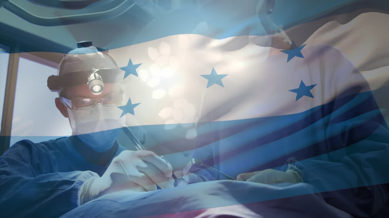 수술실에서 외과의사 위에 호두라의  ⁇ 발의 애니메이션