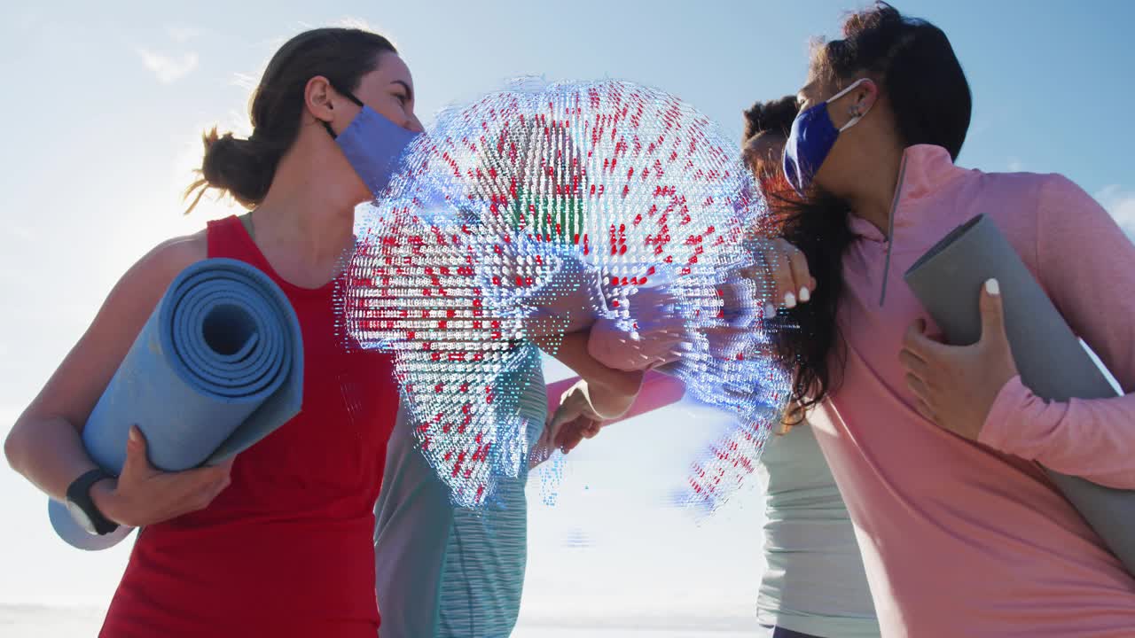 Four women approaching, elbow-bumping with mats, phone, floating globe occluding torsos during yoga