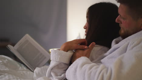 couple reading in bed