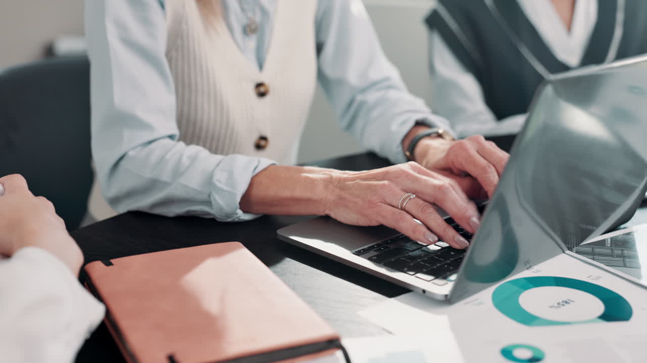 Women working on laptop in office