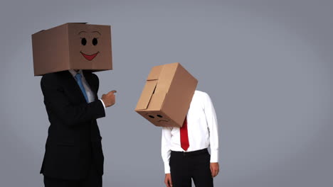 businessman speaking with box on head