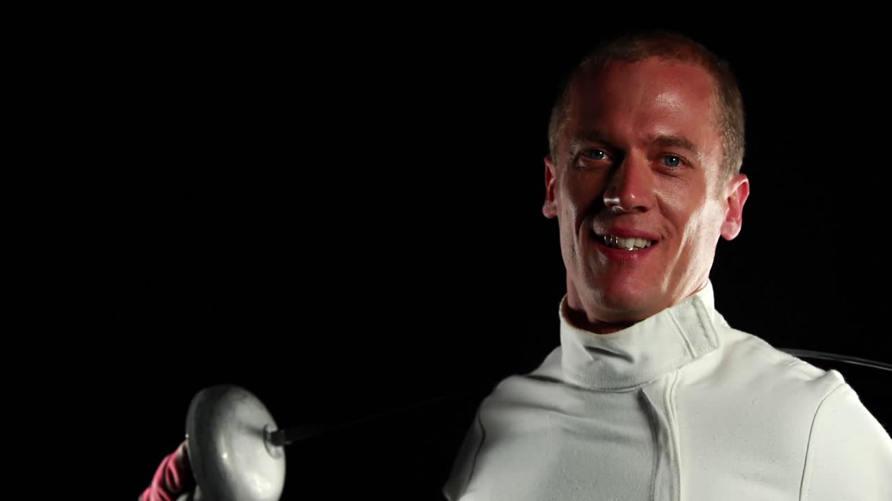 deportista que practica la esgrima