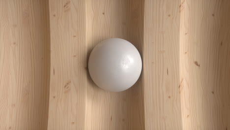 white sphere on wavy wood background