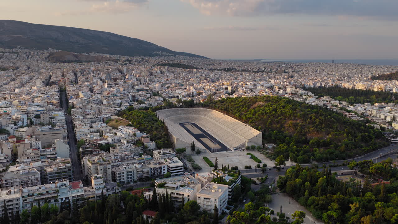 Panathenaic Stadium or Kallimarmaro, Athens Greece at sunrise, panoramic aerial establishing orbit
