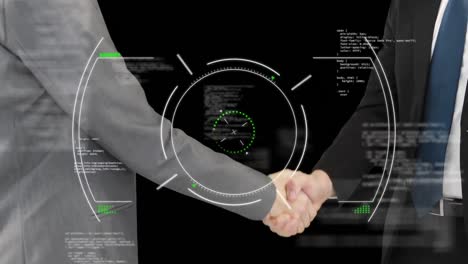 Scope-scanning-and-data-processing-against-mid-section-of-two-businessmen-shaking-hands