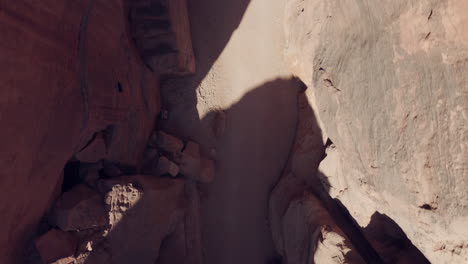 narrow gorge of the treasury canyon, petra, top aerial view