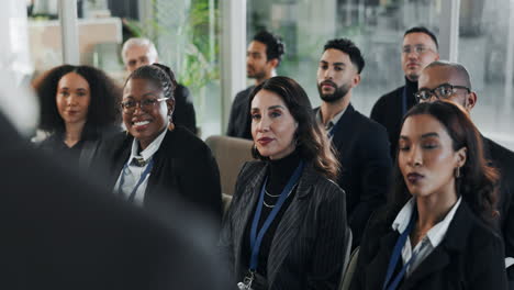diverse group of professionals attending a business meeting or conference