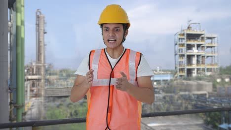 angry indian construction labour shouting on someone