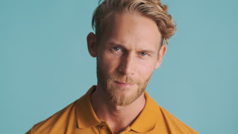 Caucasian-guy-in-polo-T-shirt-posing