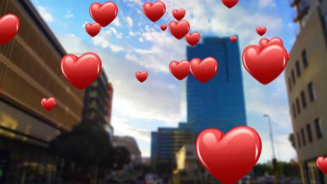 centro de la ciudad con iconos de corazones voladores 4k