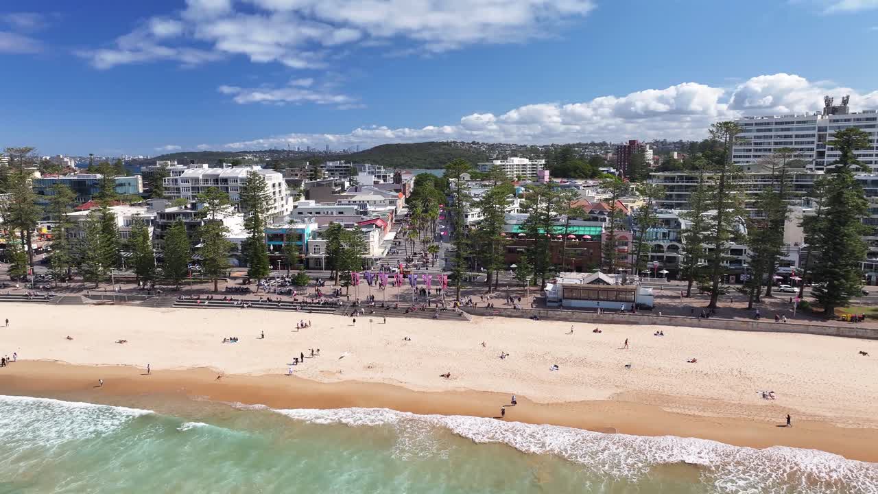 Tourists At The Sandy Shoreline Of Manly Beach On The Northern Beaches Of Sydney, Australia. Aerial Shot