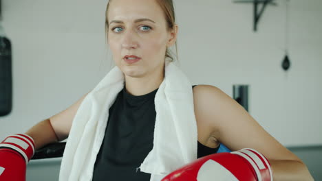 woman boxer in boxing gym