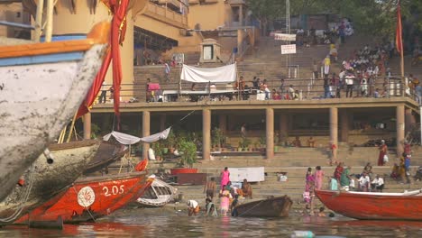 panning shot of rowing boat prow on the ganges