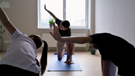 people practising yoga