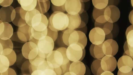 Video-of-flickering-yellow-bokeh-spots-of-light-with-copy-space