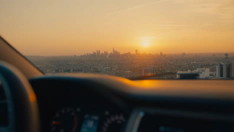 sunset city skyline view from car interior